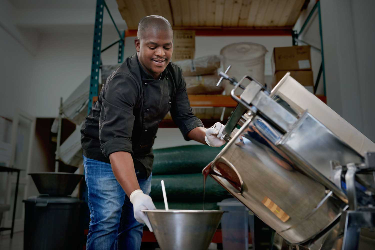 extraction specialist working with chocolate